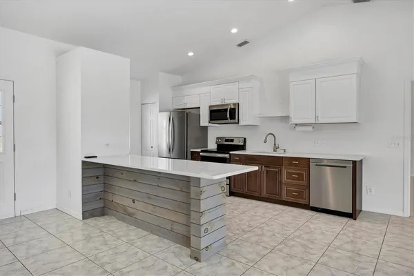 a view of an empty room with window