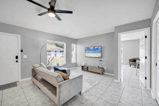 a view of a yard with flower plants