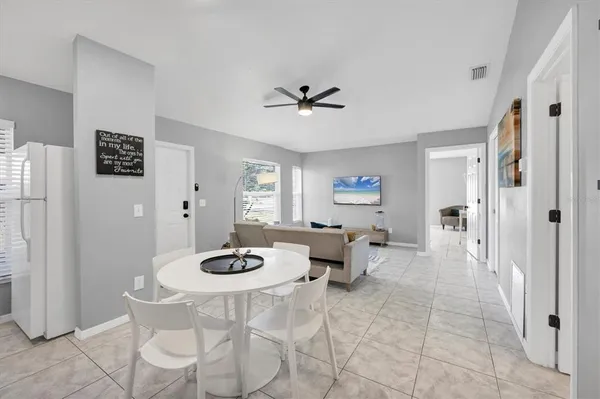 a view of a park with swings and slides