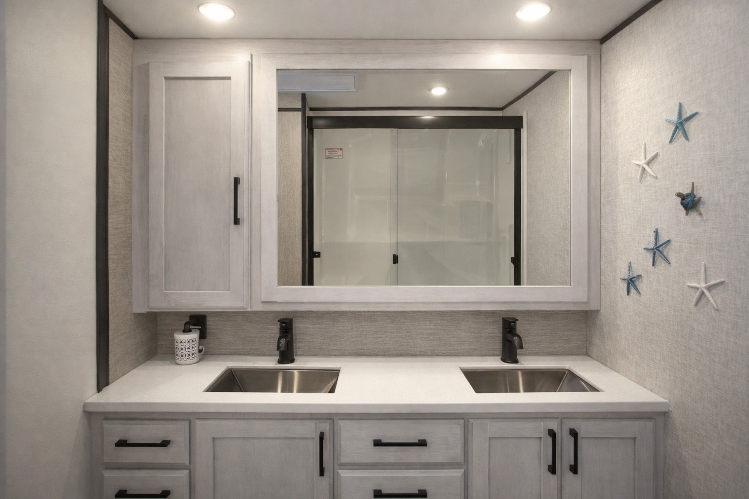 93 Swallow Street Palacios, TX 77465 - Photo 14 of 25 a bathroom with a sink and a mirror