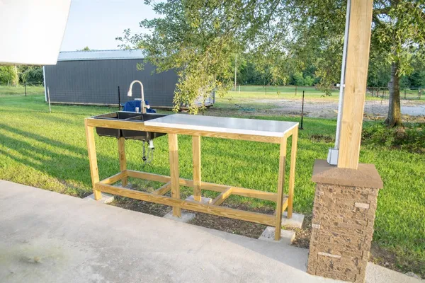 a house view with a garden space