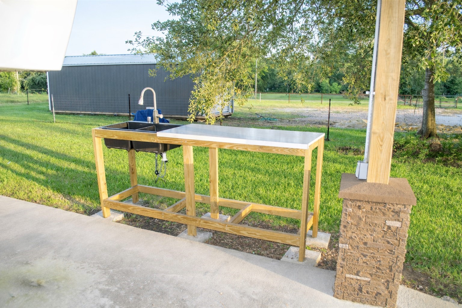93 Swallow Street Palacios, TX 77465 - Photo 17 of 25 a house view with a garden space