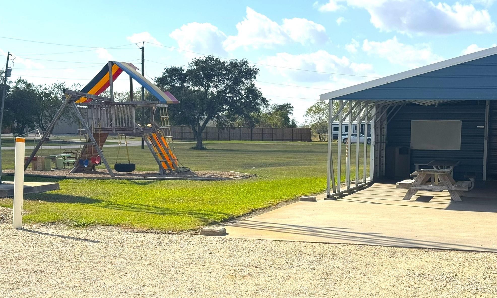 93 Swallow Street Palacios, TX 77465 - Photo 20 of 25 a view of a house with swimming pool