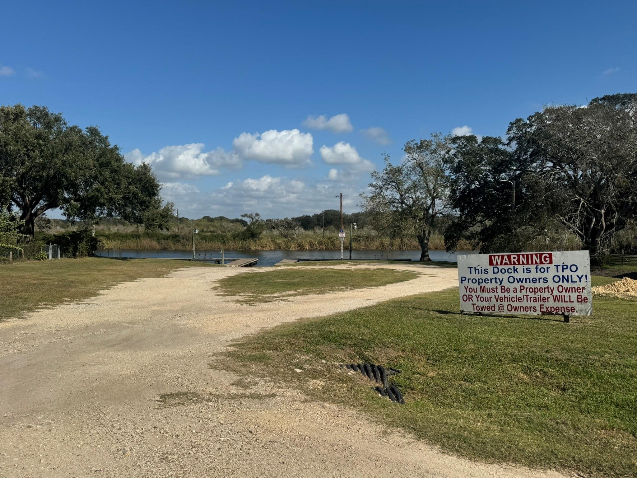 93 Swallow Street Palacios, TX 77465 - Photo 24 of 25 a view of an outdoor space and lakeside