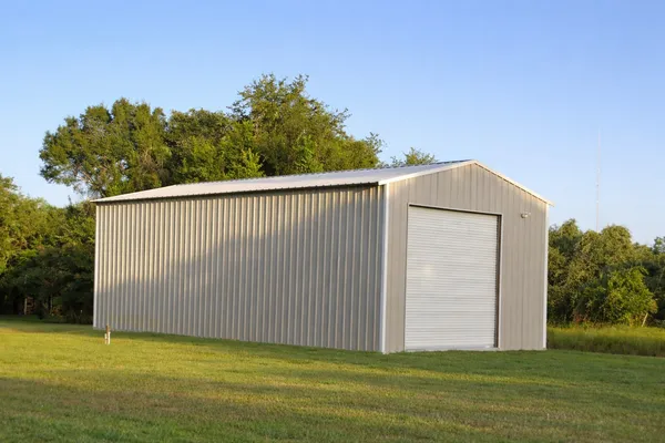 a view of a backyard with cabin