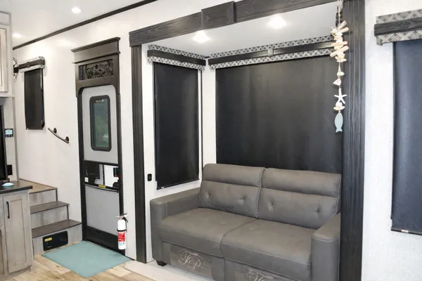 a living room with a couch and a table