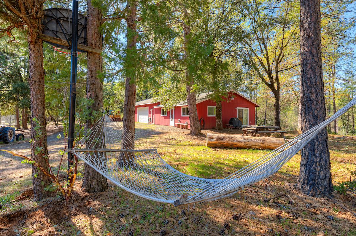 179 Elams Ranch Road Oroville, CA 95966 - Photo 21 of 52 a view of swimming pool with a patio and a yard