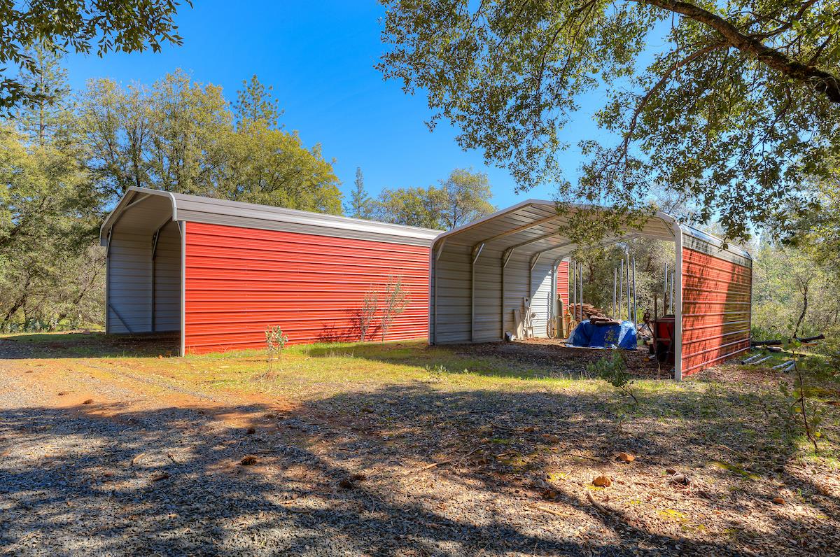 179 Elams Ranch Road Oroville, CA 95966 - Photo 30 of 52 a view of a house with backyard and trees