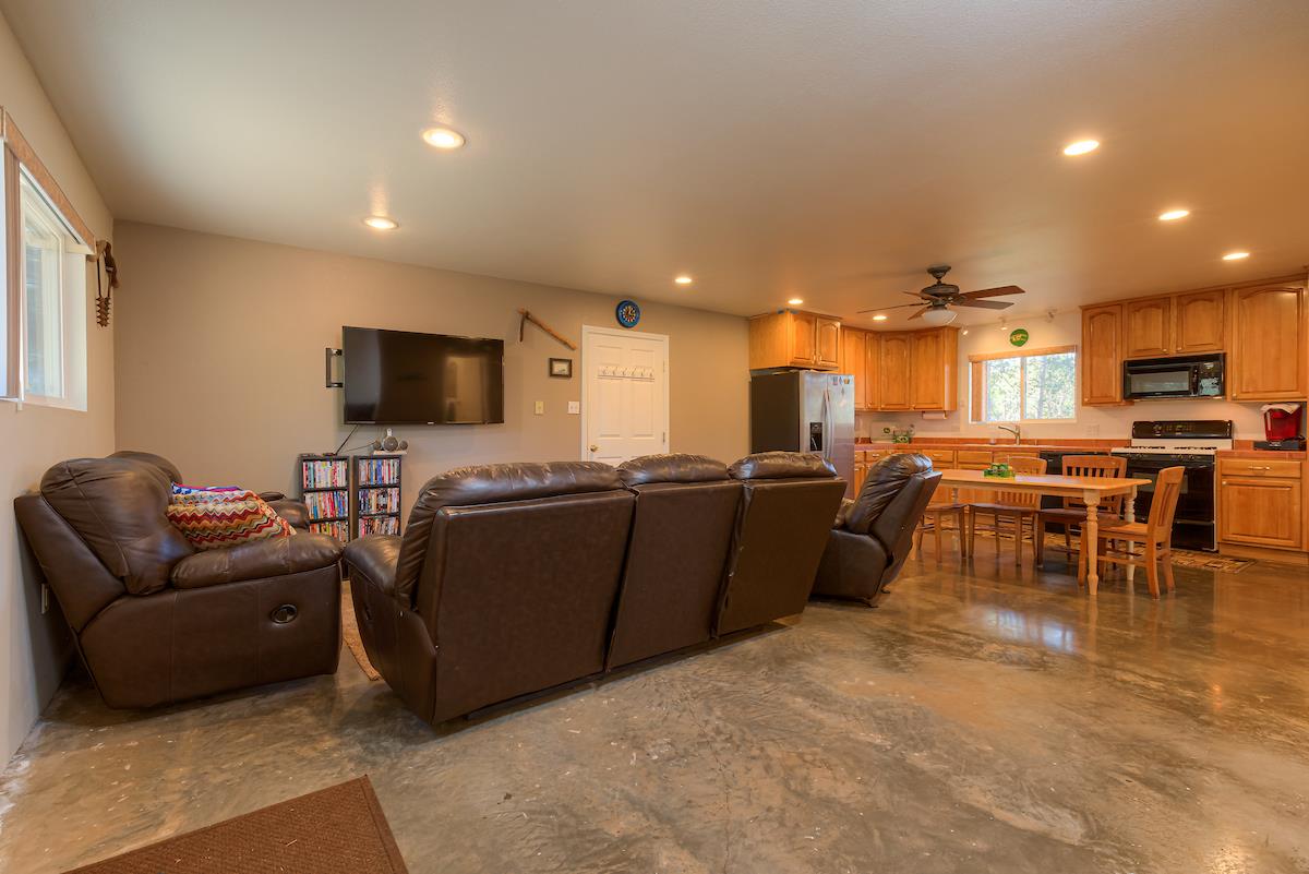 179 Elams Ranch Road Oroville, CA 95966 - Photo 4 of 52 a living room with furniture and a flat screen tv