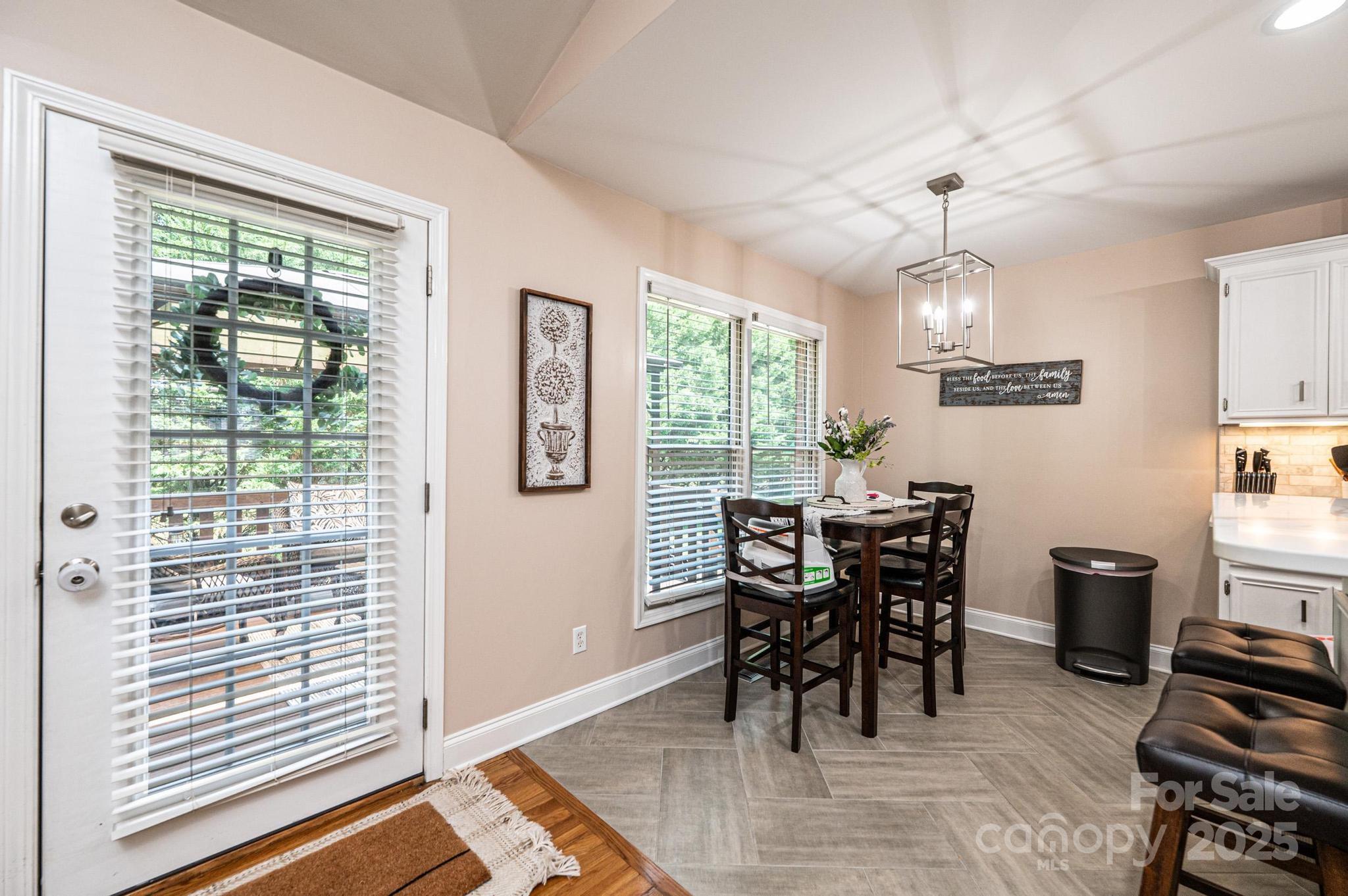 1784 New Star Drive Newton, NC 28658 - Photo 12 of 27 a view of a dining room with furniture and chandelier