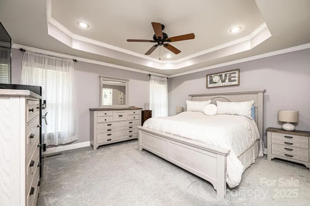 a bedroom with a bed and a walk in closet