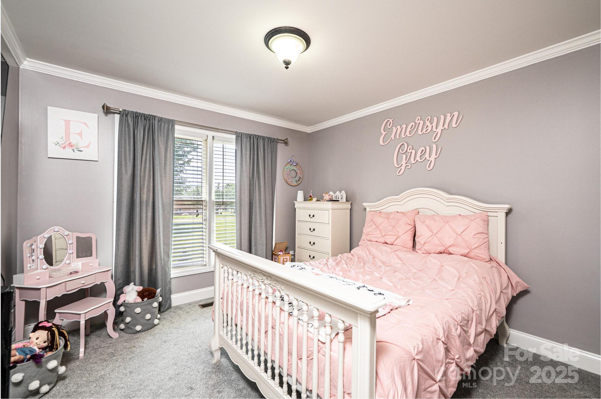 1784 New Star Drive Newton, NC 28658 - Photo 20 of 27 a bedroom with a bed and a window