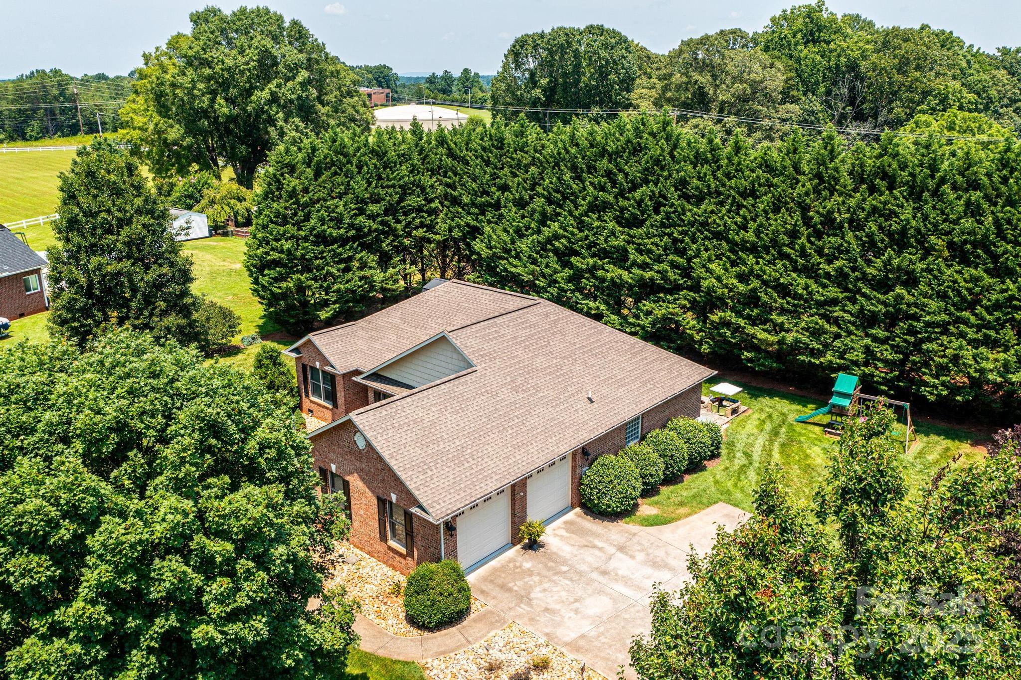 1784 New Star Drive Newton, NC 28658 - Photo 25 of 27 an aerial view of a house with yard and outdoor seating
