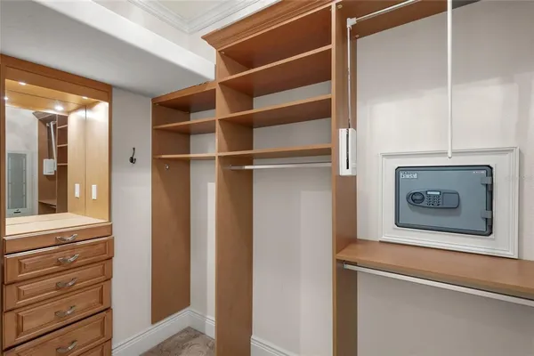 a large spacious bathroom with a granite countertop tub a sink and a large mirror