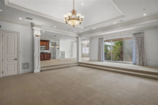 a bathroom with a granite countertop toilet a sink and a mirror