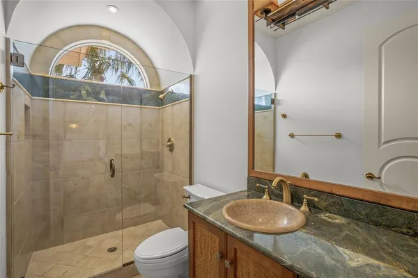 a white bath tub with a window