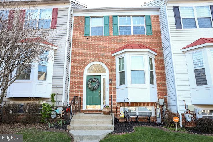 4234 Huntshire Road Randallstown, MD 21133 - Photo 1 of 43 a front view of a house with a yard