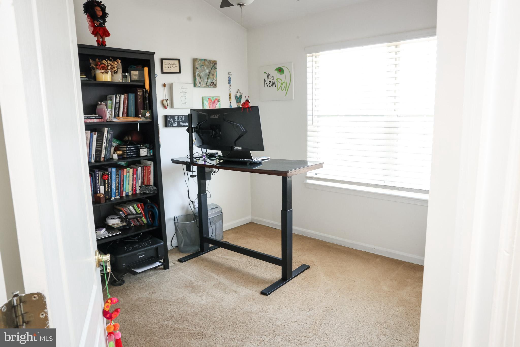 4234 Huntshire Road Randallstown, MD 21133 - Photo 23 of 43 a view of workspace with a window and shelf