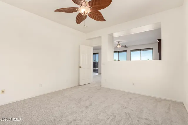 a view of a kitchen with a stove and a window