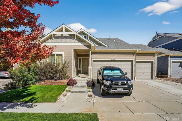 a car parked in front of a house