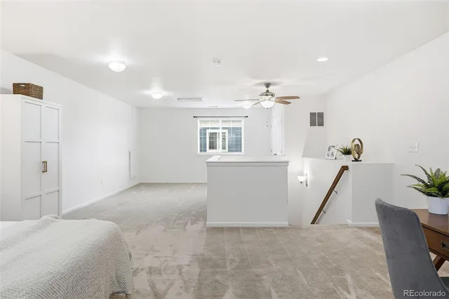 a view of a livingroom with furniture