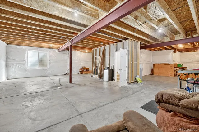a view of a house with backyard and a table