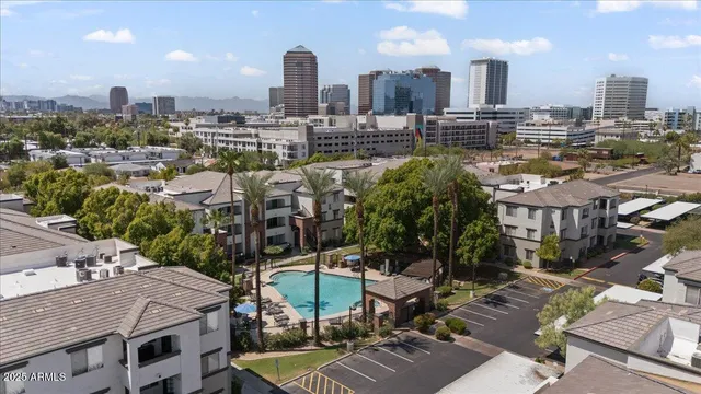 a view of a city with tall buildings