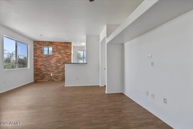 an empty room with windows