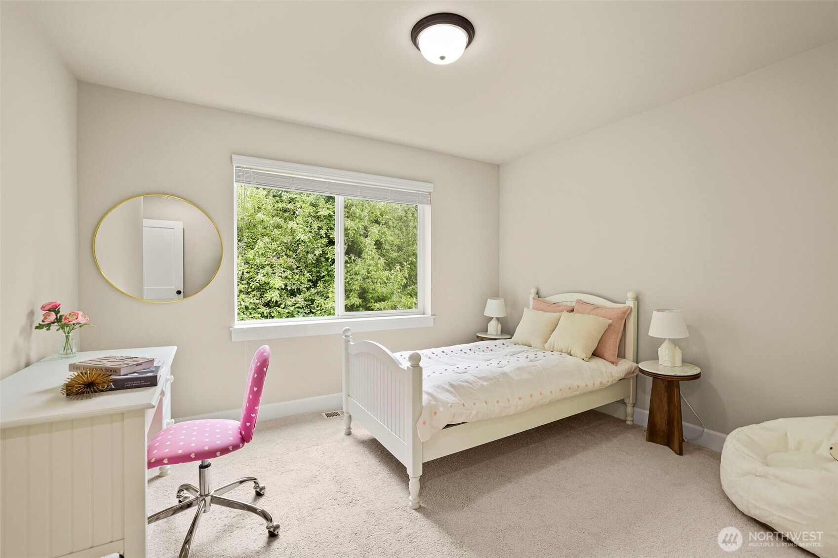 29 242nd Street Southeast Bothell, WA 98021 - Photo 26 of 40 a bedroom with a bed chair and a large window