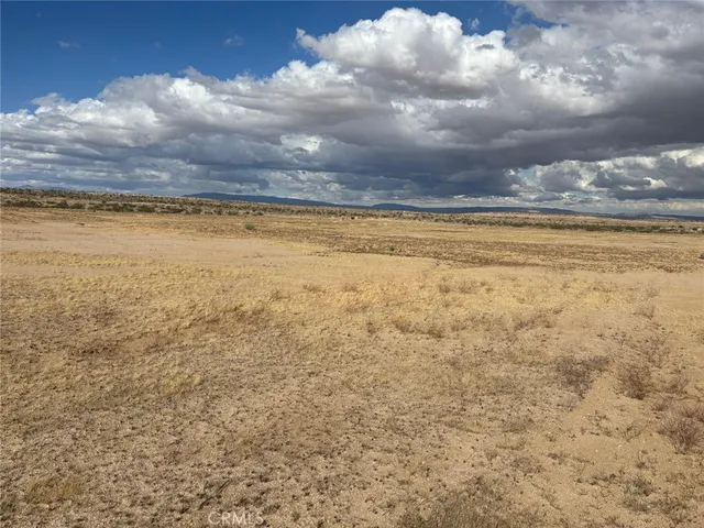 a view of an ocean and a building