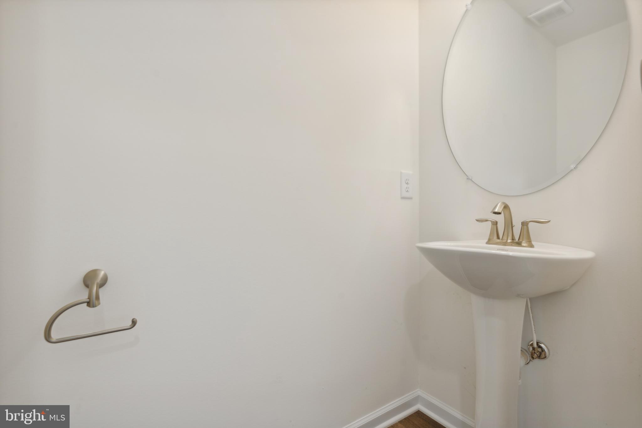 62 Flint Drive Hanover, PA 17331 - Photo 16 of 18 a bathroom with a sink and mirror