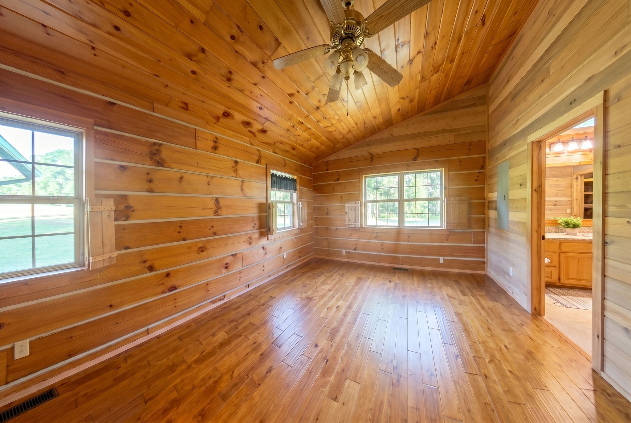 2909 B Beech Log Road Watertown, TN 37184 - Photo 29 of 67 a view of an empty room with wooden floor and a window