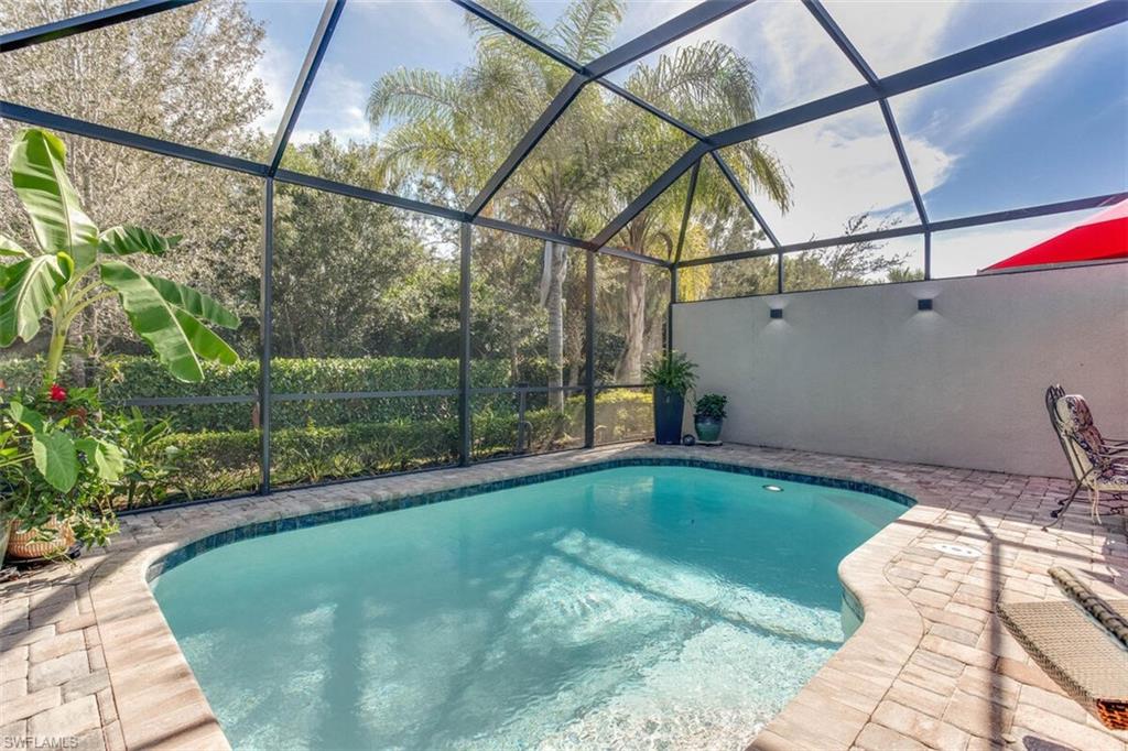 7682 Jacaranda Lane Naples, FL 34114 - Photo 32 of 44 a view of a backyard