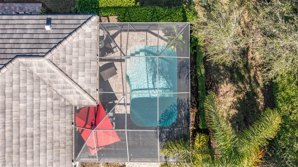 7682 Jacaranda Lane Naples, FL 34114 - Photo 35 of 44 a bird view of a house