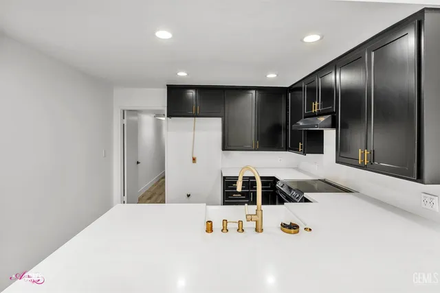 a bathroom with a tub and a sink