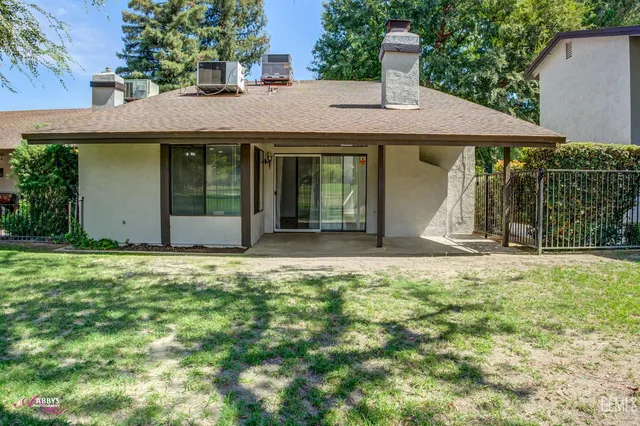a view of a house with a garden