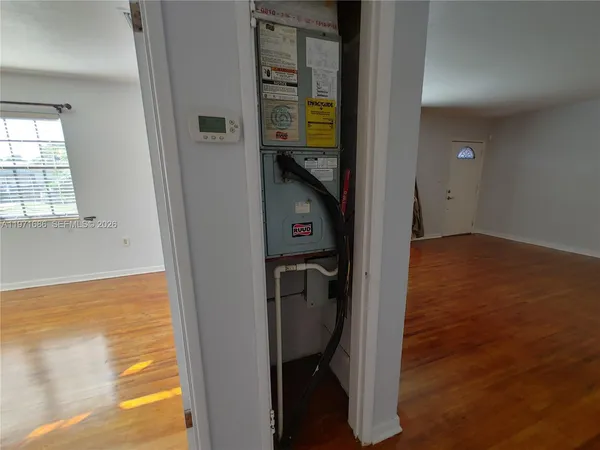 a bathroom with a toilet a sink and bathtub