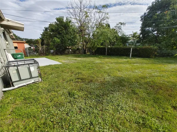 a view of a garden with a tree