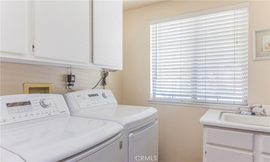 743 Orchard Loop Azusa, CA 91702 - Photo 33 of 39 a bedroom with a sink and a window