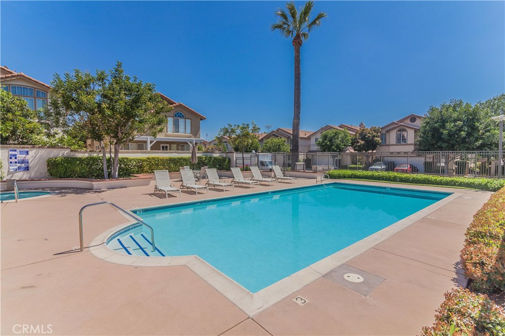 743 Orchard Loop Azusa, CA 91702 - Photo 38 of 39 a view of a swimming pool with a patio
