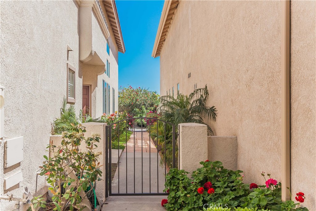 743 Orchard Loop Azusa, CA 91702 - Photo 6 of 39 a potted plant sitting in front of a door
