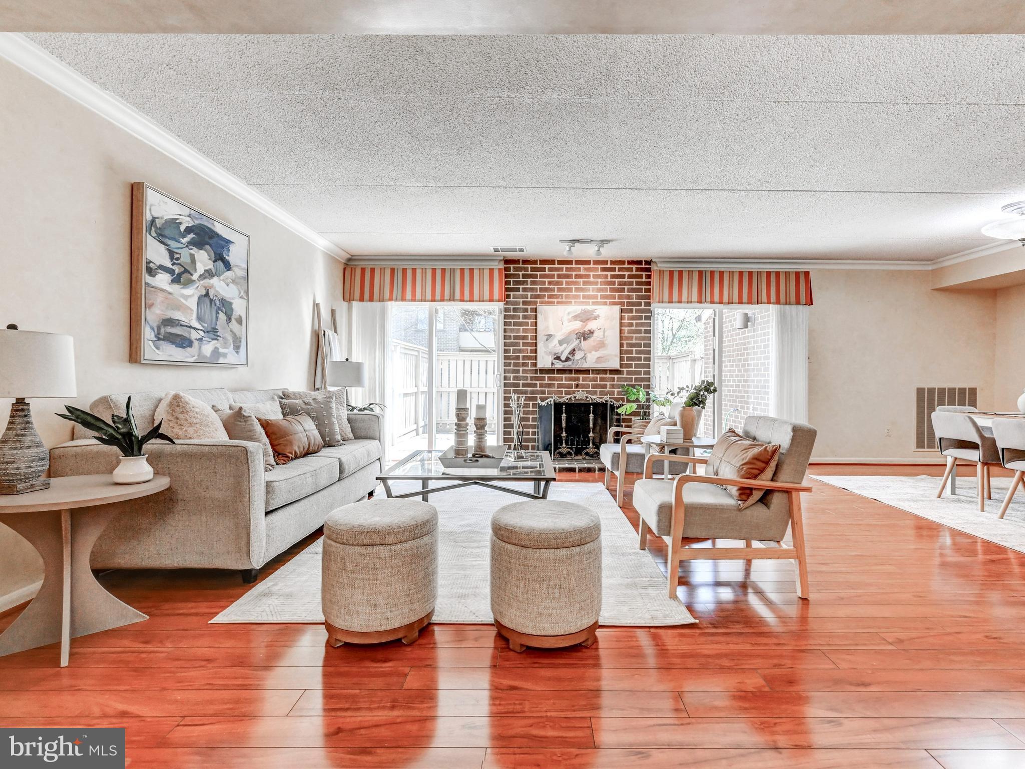 17 Pacers Lane, Unit F Pikesville, MD 21208 - Photo 5 of 24 Foyer opens to Living Room Dining Room