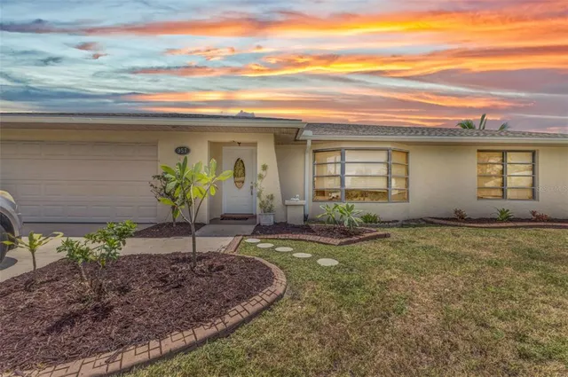 a house view with a garden space