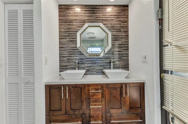 a view of storage and utility room with washer and dryer