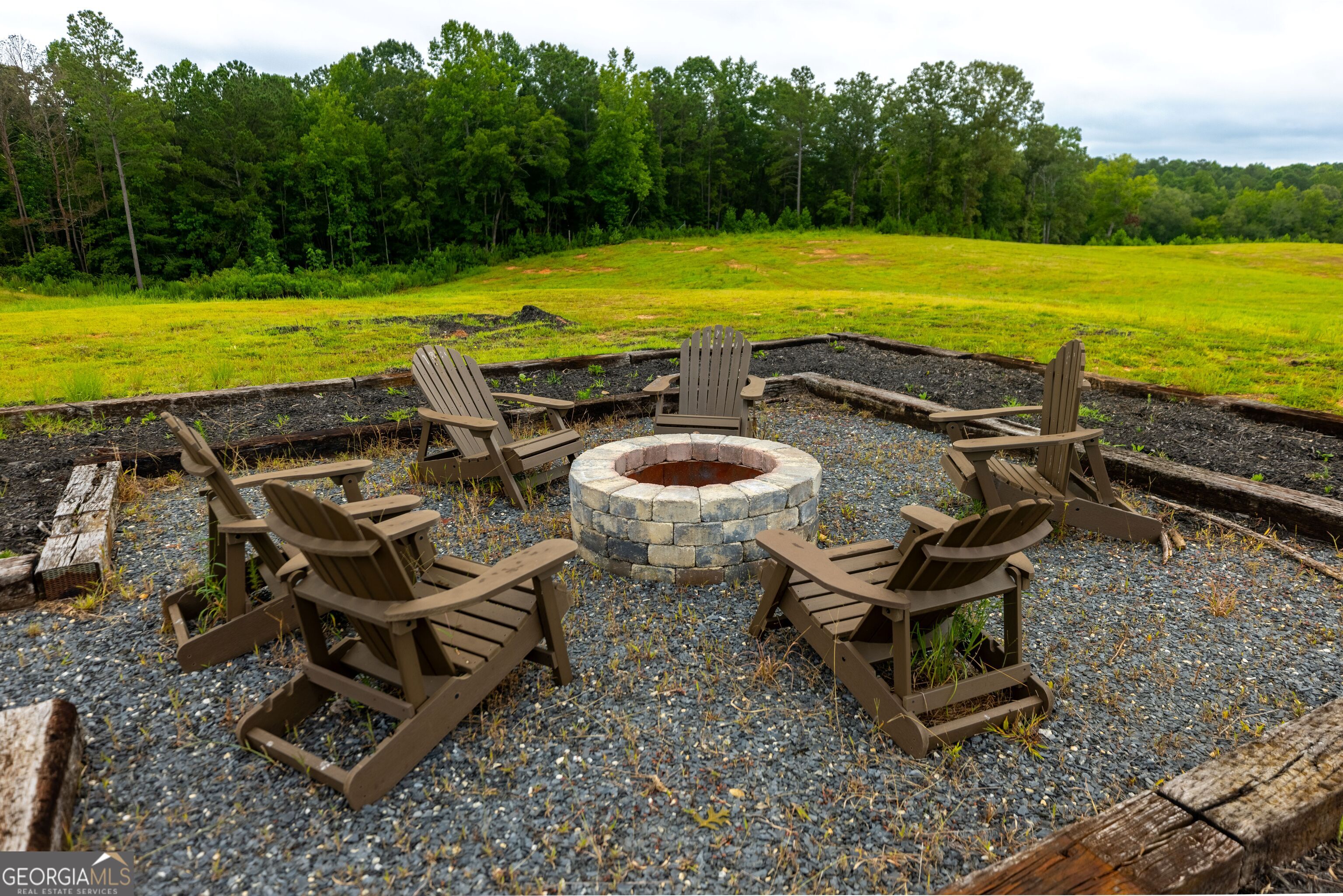 2199 Roosterville Road Roopville, GA 30170 - Photo 44 of 129 a view of a swimming pool and lounge chairs
