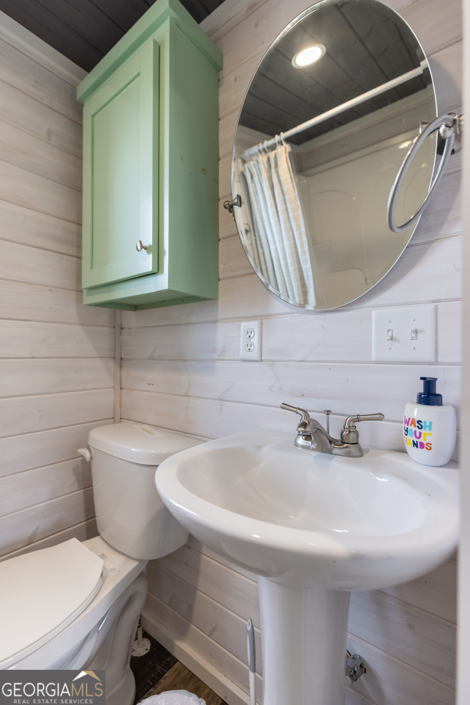 2199 Roosterville Road Roopville, GA 30170 - Photo 54 of 129 a bathroom with a sink and a toilet