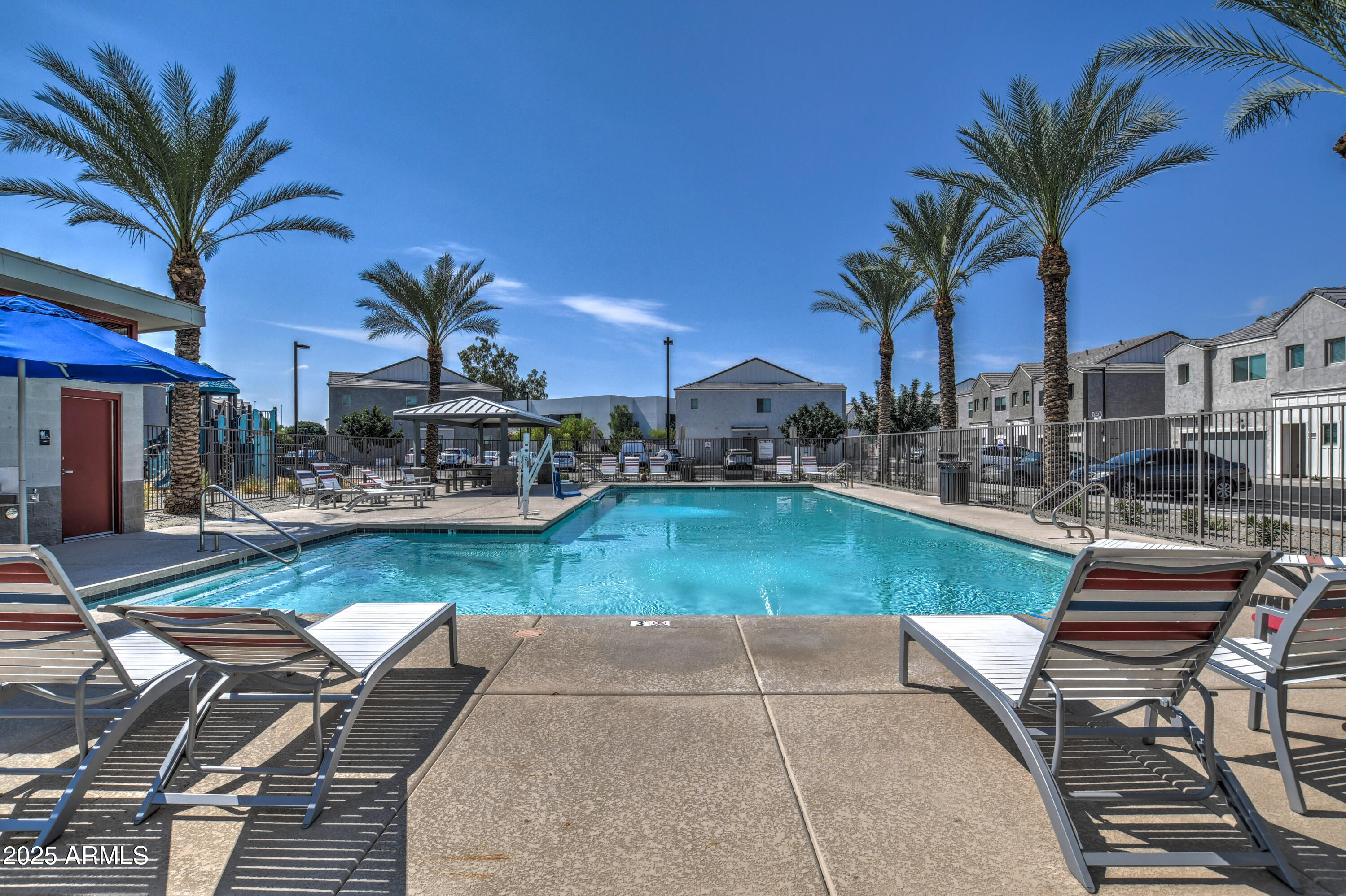 2241 West Griswold Road Phoenix, AZ 85021 - Photo 20 of 23 a swimming pool with outdoor seating and yard
