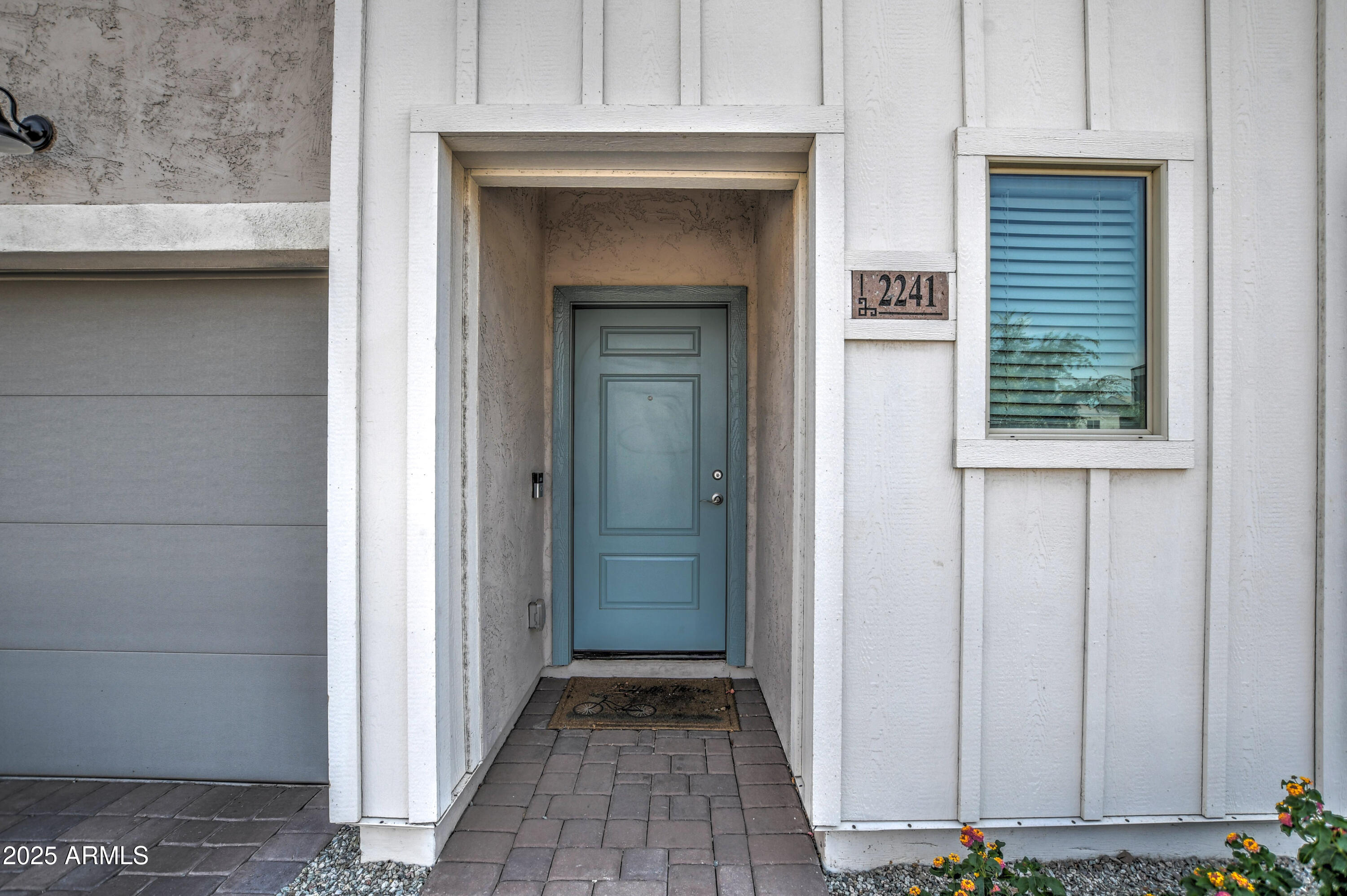 2241 West Griswold Road Phoenix, AZ 85021 - Photo 2 of 23 a view of a hallway with wooden door
