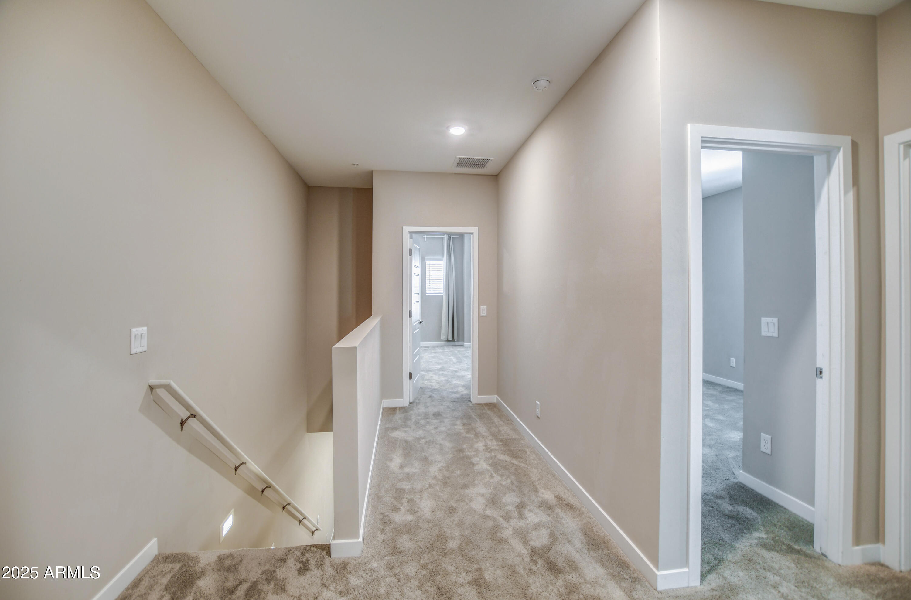 2241 West Griswold Road Phoenix, AZ 85021 - Photo 10 of 23 a view of a hallway view with staircase