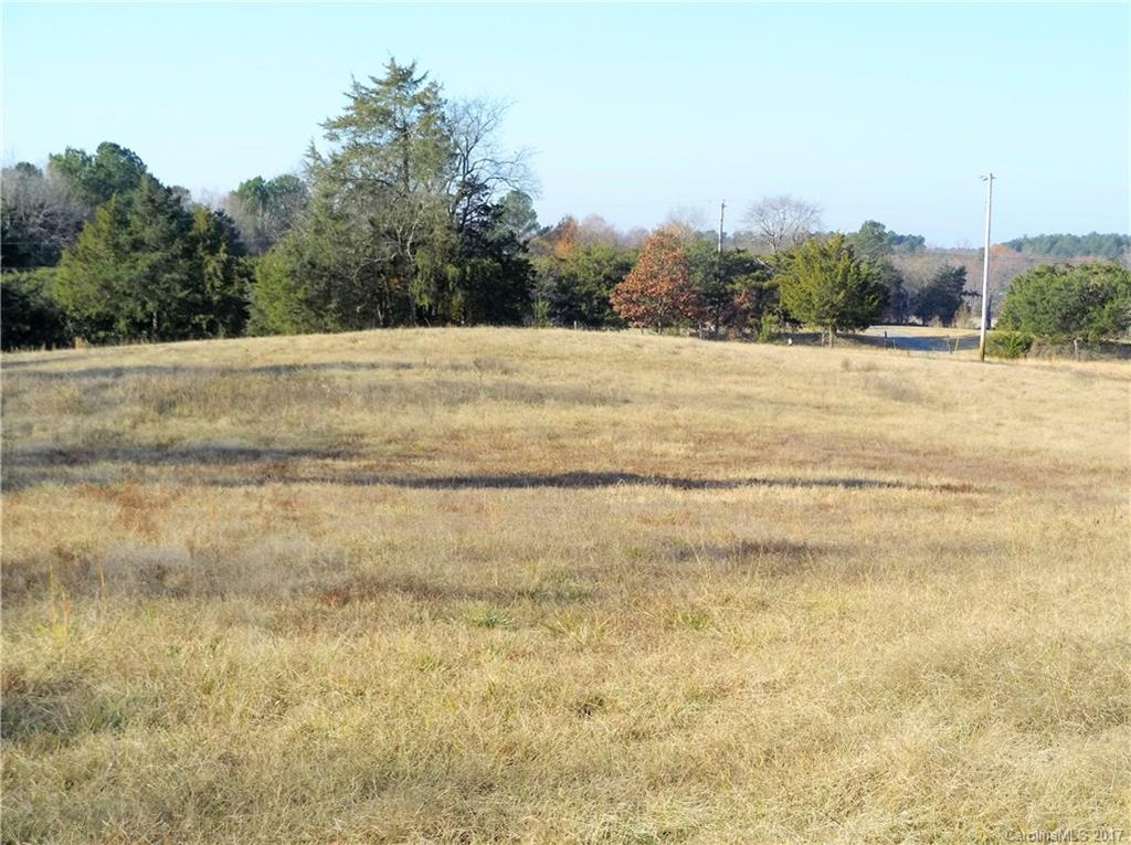 6925 Shelf Road Marshville, NC 28103 - Photo 4 of 24 a view of a field with trees